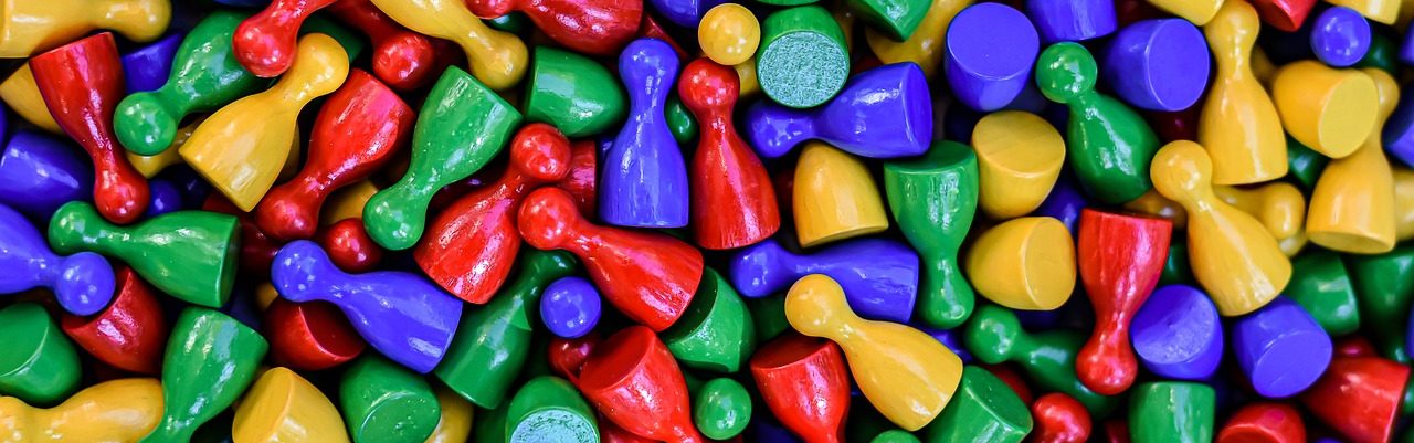 A variety of game pieces of different colors